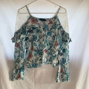 White House Black Market floral blouse with lace shoulders.